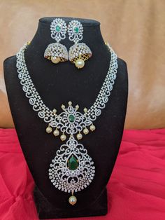 #south Indian jewelry set#bridal jewelry set#gold polished #adstones diamond jewelry #trending jewelry set with earrings Anniversary Diamond Gemstone Jewelry Sets, Festive Hand Set Fine Jewelry, Gold Diamond Jewelry Sets With Earrings, Gold Diamond Jewelry Set With Matching Earrings, Gold Diamond Bridal Necklace With Matching Earrings, Dazzling Jewelry Sets With Diamond Accents For Festive, Diamond Necklace With Matching Earrings For Anniversary, Dazzling Diamond Jewelry With Matching Earrings, Festive Hand Set Cubic Zirconia Jewelry