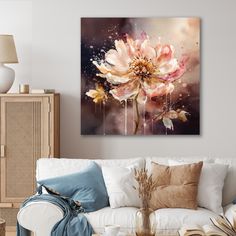 a living room scene with focus on the couch and large flower painting hanging above it