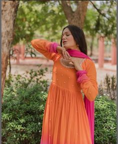 Hand embroidered Anarkali with embroidery  dupatta / orange pink anarkali suit set / anarkali dupatta USA / georgette dress with embroidered scallop dupatta / Indian dresses/ voggish / orange maxi dress         Looking for a perfect indian dress/anarkali/suit sets that are trendy, unique and easy to carry !! yess, You are at the right place. we carry such versatile pieces of anarkalis and suit sets that really let you stand out in any occassion !!      featuring this beautiful georgette dress in ombré shade of orange and pink color with hand embroidered at the front neck and body with full gathered sleeves as shown paired with matching soft georgette pink dupatta with lace finish as shown !! A very classy, beautiful look makes your occasion Perfect !! Ready to ship !! can be customized in Peach Anarkali Salwar Kameez For Festivals, Peach Semi-stitched Anarkali Set With Dabka Work, Diwali Peach Anarkali Set With Dabka Work, Diwali Peach Straight Kurta Anarkali Set, Peach Anarkali Set With Dabka Work For Diwali, Designer Orange Georgette Anarkali Set, Peach Anarkali Unstitched Suit With Resham Embroidery, Peach Anarkali Set With Resham Embroidery, Peach Anarkali Dupatta With Mirror Work