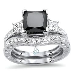 a black and white diamond engagement ring set