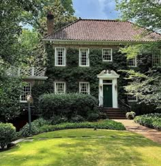 a house with ivy growing on it's side