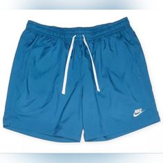 Final Price Drop! Price Is Firm! New With Tags Nike Sportswear Sport Essentials Men's Woven Lined Flow Shorts Blue Size Xl. Details: 100% Authentic Style Number: Ar2382-407 Material: 100% Polyester Color: Blue / White Size: X-Large Standard Fit For A Relaxed, Easy Feel Mid Thigh Length 5.5" Inseam An Elasticated Waistband And Drawcord Provide A Comfortable, Personalized Fit Side Pockets One Open Pocket On Back Futura Logo On The Left Leg Is Embroidered. Size Approximately: Waist 17" One Side, 17 Sporty Nike Swim Trunks, Sporty Nike Swim Trunks With Pockets, Casual Nike Swim Trunks With Built-in Shorts, Blue Shorts For Sports Season, Blue Swim Trunks For Sports, Casual Blue Activewear For Jogging, Blue Short Length Swim Trunks For Sports, Nike Blue Swim Trunks For Summer, Nike Blue Casual Swim Trunks