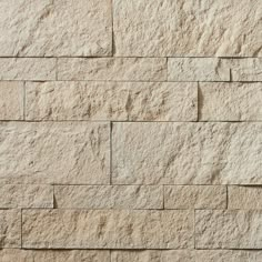 a close up view of a stone wall