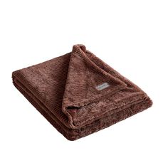 a brown towel folded on top of each other