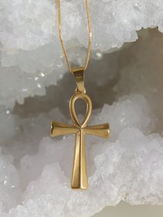 The Ankh, an ancient Egyptian symbol often called the "Key of Life," carries metaphysical properties rooted in life, wisdom, and eternity. Representing the merging of male and female energies, it symbolizes balance and harmony. The Ankh is thought to hold the power of life and creation, offering protection, vitality, and a connection to higher realms. Used as a talisman for health and well-being, it's believed to amplify life force energy, fostering spiritual growth and a deeper understanding of Cheap Spiritual Jewelry With Large Pendant, Anhk Necklace Gold, Luxury Symbolic Ankh Necklaces, Cheap Ankh Spiritual Jewelry, Cheap Ankh Shaped Metal Jewelry, Cheap Ankh-shaped Spiritual Jewelry, Cheap Ankh Shaped Spiritual Jewelry, Luxury Spiritual Cross Pendant Necklace, Luxury Spiritual Necklace With Cross Pendant