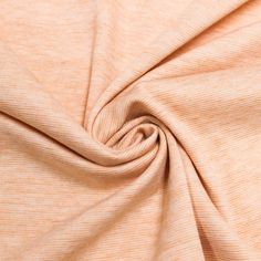 a close up view of an orange fabric