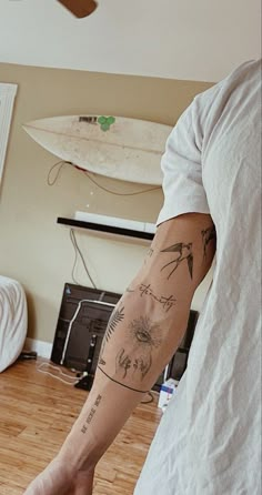 a man with a tattoo on his arm