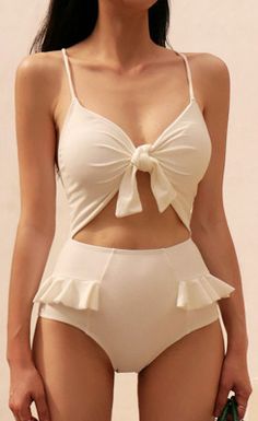 $49.90 -  White beige one piece bikini chunky with ruffles and  knot for elegant ladies, teens, and feminine women. Good swimsuit swimwear for summer beach. Beige Swimsuit, Suits With Shorts, Bathing Suit Ideas, Retro Bathing Suits, High Waist Swimsuit, Solid Color Bikinis, Suit Ideas, Cut Out One Piece, Feminine Women