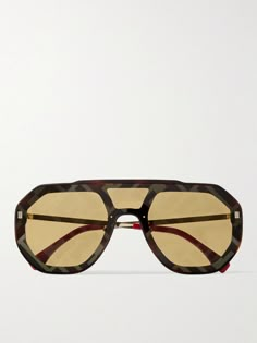 Fendi's aviator-style sunglasses are designed to make a statement. The oversized lens is printed with the house's iconic 'FF' monogram pattern, while the arms are accented with bold red acetate tips. Burberry Amelia Sunglasses, Fendi Collection, Fendi Eyewear, Italian Sunglasses, Silver Sunglasses, Fashion Eye Glasses, Stylish Glasses, Monogram Pattern, Summer Sunglasses