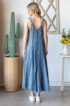 Expertly crafted in a relaxed fit, this WASHED RUFFLE SEAM DETAIL MAXI DRESS is a must-have for any wardrobe. The mineral wash detail adds a unique touch, while the ruffle seam detail adds a feminine touch. Imported and true to size, this dress is perfect for any occasion. Our model wears size S. Blue Maxi Dress For Summer Loungewear, Blue Sleeveless Maxi Dress For Loungewear, Bohemian Cotton Dress With Frayed Hem, Bohemian Medium Wash Cotton Dress, Blue Relaxed Fit Dress For Spring, Blue Maxi Dress For Spring Loungewear, Blue Relaxed Fit Maxi Dress For Daywear, Casual Blue Maxi Dress With Relaxed Fit, Bohemian Dresses For Spring