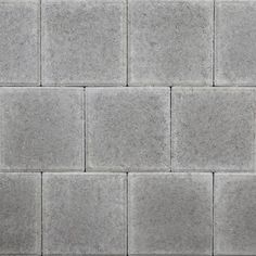 a gray brick wall that is very close up