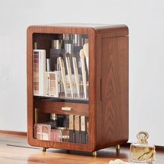 "W H Y ∙ Y O U ' L L ∙ L O V E ∙ I T *To give your Makeup Beauty Cosmetic & toiletry,jewelry a space for orderly placement, it is absolutely right to choose this  High-capacity Vintage Wooden Makeup Organizers Storage box! *The  Large Cosmetic Storage box with door and 2 drawer,High-end cosmetics storage box, elegant and generous,the reasonable zoning layout,so that your various cosmetics tools and supplies can be placed in order. *The lotion storage compartment is 18.5cm high,it is  easy to store and use.such a refrigerator makeup cabinet, beautiful and magnificent,make people like it at a glance. *The  Cosmetic Storage cabine,design 2 drawer,the top drawer without partition, can hold Facial mask, sunglasses, watches, etc,the bottom drawer set Large grid, small grid partition,can hold wat Makeup Cabinet, Wooden Makeup Organizer, Lotion Storage, Makeup Storage Organization, Custom Jewelry Box, Cosmetic Display, Bathroom Countertop, 5th Anniversary, Cosmetic Organizer