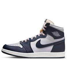 The Air Jordan 1 Retro High '85 'Georgetown' is a stylish sneaker with a classic silhouette. It features a navy blue upper with a grey midsole, white wings logo, and a rubber sole. The design is inspired by the Georgetown Hoyas basketball team and is perfect for any activity. It is a timeless classic that will never go out of style. The navy blue and grey colorway gives the sneaker a sleek and modern look that will make a statement. The Air Jordan 1 Retro High '85 'Georgetown' is a must-have for any sneaker enthusiast. (AJ1/SNKR/Unisex/High Top/Basketball/Wear-resistant/Shock-absorbing) Navy Sneakers With Rubber Sole For Streetwear, Navy Custom Sporty Sneakers With Cushioned Footbed, Navy Round Toe Sneakers With Gum Sole, Casual Navy Sneakers With Comfortable Midsole, Navy Sports Sneakers With Gum Sole, Navy Streetwear Sneakers With Rubber Sole, Navy Basketball Shoes With Boost Midsole For Streetwear, Gray High-top Sneakers With Gum Sole For Sports, Navy Sneakers With Boost Midsole For Light Sports