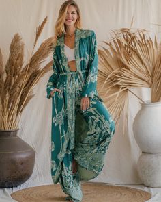 Our Aphrodite Original Kaftan, made from soft viscose double gauze fabric, offers a luxurious feel and an ethereal appearance. Designed to enhance your presence in any setting, its flowing silhouette and lightweight, breathable fabric ensure a graceful and comfortable fit. Ideal for lounging by the pool or attending special events, this piece is perfect for making a statement. Its versatile design provides multiple styling options, making it an indispensable addition to your wardrobe. Celebrate your divine beauty and radiate grace with our reversible Original Kaftan Bohemian Silk Robe For Loungewear, Silk Bohemian Robe For Loungewear, Bohemian Silk Kaftan For Daywear, Silk Bohemian Kaftan For Daywear, Bohemian Floor-length Wedding Kimono, Flowy Maxi Kimono For Loungewear, Flowy Maxi Length Kimono For Loungewear, Bohemian Rayon Kimono For Loungewear, Elegant Maxi-length Kimono For Loungewear