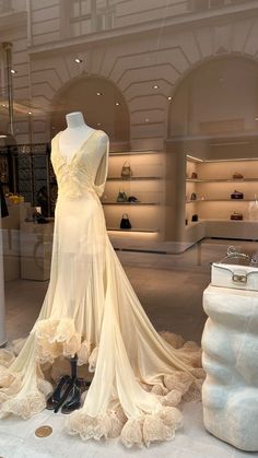 a dress and shoes on display in a store