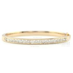 "This bangle is made with 2.12 Ct. SI Clarity G-H Color Natural Diamond Solid 18K Yellow Gold Channel Setting Bangle Bracelet Handmade Dainty Jewelry. * SKU: SGBN00084 * Made to Order. * Gold Purity: 14K Solid Yellow Gold (stamped) * Custom Gold Color: Rose Gold, Yellow Gold, White Gold * Custom Gold Purity: 9K/14K/18K (Charges Apply) * Diamond 100% Genuine Diamond * Diamond Weight: 2.12 ct. * Diamond Color: G-H * Diamond Clarity: SI1- SI2 * Diamond Cut: Brilliant Cut (Excellent) Product Measure Wedding Diamond Bangle Bracelet With Prong Setting, Wedding Bangle Diamond Bracelet With Prong Setting, Wedding Diamond Bangle With Prong Setting, Formal Diamond White Channel Set Bracelet, Diamond White Channel Set Diamond Bracelet For Wedding, Wedding Diamond Bangle Bracelet With Brilliant Cut, Wedding Diamond White Channel Set Bracelet, Channel Set Diamond Bangle Bracelet, Wedding Channel Set Diamond White Bracelet