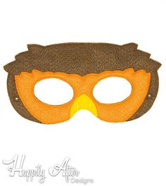 an orange and brown bird mask on a white background