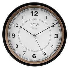 a black and gold clock with the word ecw on it's face is shown