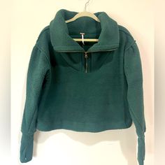 This Sweatshirt Is Adorable, It Has An Oversized Collar With A Half Zip In The Front. It’s Sherpa With Details On The End Of The Sleeve To Make It More Fitted. The Color Is Forest Pine And The Size Is A Small. This One Is New With Tags. Trendy Oversized Half-zip Top, Trendy Half-zip Top With Ribbed Cuffs, Green Fleece Half-zip Top, Green Athleisure Tops For Fall, Green Fleece Tops For Loungewear, Green Fleece Loungewear Top, Green Fleece Top For Loungewear, Green Half-zip Top, Green Comfy Tops For Fall