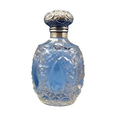 a blue glass bottle with a silver top