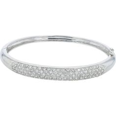 Escape to an era of elegance with a timeless treasure: the 18K White Gold 2.26 Carat Diamond Bangle. Crafted with exquisite attention to detail, this bangle exudes sophistication and grace. The main attraction? A dazzling diamond, weighing a substantial 2.26 carats, set delicately in lustrous 18K white gold. As it adorns your wrist, it whispers tales of luxury and refinement, making every gesture a statement of style.This bangle is not just an accessory; it's a symbol of opulence and class. Whether worn alone for a touch of understated glamour or stacked with other favorites for a bolder look, it elevates any ensemble effortlessly. Let its radiant sparkle capture the light and hearts of onlookers, leaving a trail of admiration in its wake.Indulge in the allure of fine jewelry with this stu Luxury Polished White Gold Bangle, Luxury Classic Diamond White Bangle, Understated Glamour, Main Attraction, Diamond Bangle, Timeless Treasures, A Symbol, Bangles, Fine Jewelry