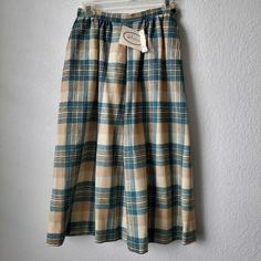 # 100% Virgin Wool # A-Line Plaid Skirt # Cream/Beige Blue Combo Colors # Not Lined # Dry Cleaned # Pockets And Button At Waist. # Size 8 ( Vintage Sizing Please See Measurements). # Approximately Waist 13 In Length 30 In Measurements Are An Estimate. # New With Tag. Never Worn Or Washed. # Final Sale. Please Note: Even Though The Skirt Is In Excellent Condition, There Is A Strong Perfume/Vintage Scent. I Am Selling Because Too Small For Me Unfortunately. There Is No Give At The Waist. I Am A 26 Pendleton Skirt, Plaid Cotton Long Skirt, Long Wool Plaid Skirt, Vintage Long Plaid Skirt, Vintage Plaid Cotton Skirt, Red Plaid Skirt, Lightweight Skirt, Preppy Spring, Rose Skirt