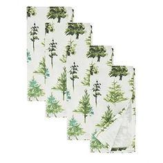 four napkins with trees printed on them