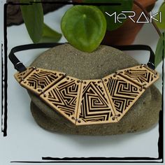 Laser cut wood and steel geometric necklace. Light, elegant and comfortable to wear all day. Cut on 6mm thick poplar wood glued on a black inner tube and mounted with a stainless steel magnetic clasp that does not rust or darken over time, the cord is made of solid black rubber. The pendant measures 14 x 6 cm. The colour may be slightly different from the item shown in the pictures, the tone and grain of the wood may vary due to materials used and different screen settings. All the pieces are as Wood Laser Engraving Machine, Laser Cut Necklace, Laser Cut Wood Crafts, Necklace Wood, Wood And Steel, Laser Cut Jewelry, Laser Cut Earrings, Engraved Pendant, Laser Engraving Machine