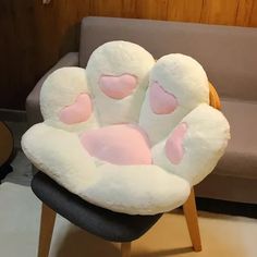 a chair that has some kind of stuffed animal on it