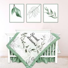 a baby crib with two green leaves on it and the name grace written in black