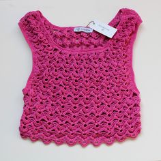 Pink crochet crop top delicate unique design Available in UK 8 to buy now. See below on how to preorder if you would like a different size: We're a UK brand that specialise in handmade clothing. All our items are created by Anne Lee, with help from Amy. Our styles reflect hippie/bohemian fashion and we like to mix bright colours and patterns to create one of a kind items.  Every item is slightly different and unique, all handmade personally for you with love. This means we only sell in limited quantities and not every size/style is listed. If you are interested in an item and would like to pre-order this in your size, please send us a message. Please check out our other items x Summer Cropped Crochet Lace Top, Spring Pink Crochet Crop Top, Spring Knitted Crop Top, Spring Crochet Crop Top, Pink Fitted Crochet Crop Top, Bohemian Cropped Open Knit Crop Top, Knitted Cropped Crop Top For Summer, Spring Crochet Lace Crop Top, Pink Fitted Cropped Crochet Top