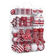 a clear box filled with red and white ornaments