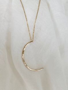 Luna Moon Necklace | James Michelle Jewelry Minimalist Moon-shaped Adjustable Jewelry, Minimalist Adjustable Moon-shaped Jewelry, Gold Moon-shaped Metal Jewelry, Hammered Crescent Jewelry Gift, Adjustable Crescent Rose Gold Jewelry, Hammered Half Moon Jewelry As A Gift, Hammered Half Moon Jewelry For Gift, Hammered Half Moon Jewelry For Gifts, Minimalist 14k Gold Moon Charm Jewelry