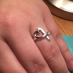 Tiffany & Co. Loving Heart Ring. Sterling Silver. Size 6.5. Recently Cleaned At Tiffany And Not Worn Since. Excellent Condition! Love Ring Tiffany & Co., Jewelry Tiffany, Loving Heart, 5 Rings, Tiffany Co Jewelry, Ring Color, Ring Sterling Silver, Womens Jewelry Rings, Tiffany & Co.