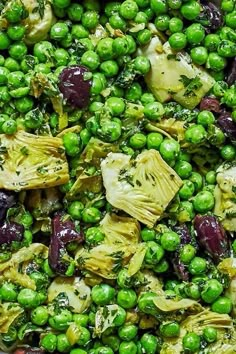 peas, artichokes and broccoli are mixed together in a dish