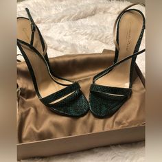 Brand New In Original Box With Dust Bags. Never Worn. These Were Limited Edition! I Bought In A Boutique In Nj A Few Years Ago. Gorgeous Emerald Green Python Skin. 100mm Heel Height. Elegant Green Heels With 4-inch Heel, Elegant Green Heels For Party, Elegant Green Heels With Padded Heel, Elegant Green Heels With Heel Strap, Chic Green Heels For Events, Glamorous Green Heels For Evening, Elegant Green Heels For Evening, Elegant Green Evening Heels, Elegant Green Heels For Events