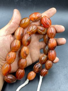 Old ancient genuine natural carnelian carved bead necklace Carved Amber Spiritual Necklaces, Artisan Carved Amber Necklace, Carved Amber Round Beads Jewelry, Carnelian Necklace, Beaded Animals, Lovely Ring, Coral Beads, Beaded Necklaces, Jewelry Companies