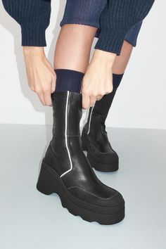 Deandra Black Boots | Miista Europe | Made in Portugal Miista Boots Styled, Black Leather Low-top Platform Boots, Black Zara Platform Boots, Zara Black Platform Boots With Lug Sole, Black Leather Platform Mid-calf Boots, Miista Boots, Booties Outfit, The Seventies, Black Rubber