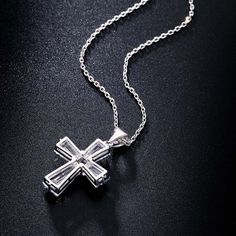 Love the New Elegant Cubic Zirconia Cross Necklace? Sometimes You Never Know The True Value Of A Moment Until It Becomes A Memory. And then you have this beautiful piece of jewelry to remind you of that special moment wherever you go. When was the last time you treated yourself to a lovely gift that reminds you of the most important events in your life? Carry your cross every day and remember what true love looks like. The New Elegant Cubic Zirconia Cross Necklace is carefully crafted with coppe White Cubic Zirconia Jewelry For Mother's Day, Elegant Personalized Cross Pendant Jewelry, Elegant Cross Pendant Jewelry For Mother's Day, Elegant Personalized Cross Jewelry, Sterling Silver Cross Pendant Jewelry For Valentine's Day, White Cross Jewelry For Valentine's Day, Gift Diamond White Sterling Silver Cross Necklace, Diamond White Sterling Silver Cross Necklace For Gift, Diamond White Sterling Silver Cross Necklace As Gift