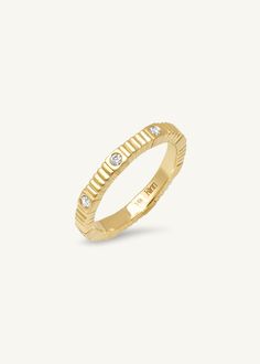 Eternity ribbed ring 14k Gold Eternity Band With Single Diamond, Timeless Stackable Diamond Ring, Classic 14k Gold Eternity Band With Single Diamond, Timeless 14k Gold Eternity Band With Single Cut Diamonds, Fine Jewelry Yellow Gold Eternity Band With Single Diamond, Timeless Stackable Eternity Band, Timeless Yellow Gold Bands With Diamond Accents, Yellow Gold Eternity Band With Single Diamond, Timeless Yellow Gold Channel Set Diamond Ring