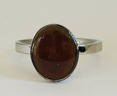 This is a beautiful mood ring. Changes color with your mood. Band is stainless steel which will never tarnish, rust, or change color. And is hypoallergenic! Pair up with any of my name rings. I ship out in 1-2 business days and guarantee customer satisfaction. Handmade Retro Rings As Gift, Mom Rings Stackable, Stainless Steel Wedding Bands, Colorful Ring, Cool Ring, Teen Jewelry, Jewelry Colorful, Mom Ring, Green Ring