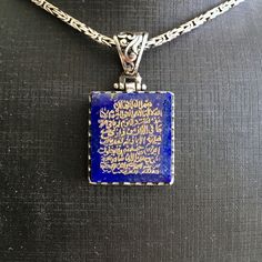 PENDANT: Lapis Lazuli(natural) METAL : .925 Sterling Silver DIMENSIONS : 24 x 22 mm CHAIN: Byzantine King chain METAL : .925 Sterling Silver LENGHT: 55 cm - 21inches THICKNESS: 2 mm What is engraved on the stone? There are certain verses in the Quran that were revealed by Allah to help guide us. They are so powerful that by simply reciting them you, your home and your family would be protected from many evils and from the powers of Shaitan.This verse is ayah 255 from Surah Baqarah commonly refer Silver Carved Rectangular Jewelry, Silver Rectangular Carved Jewelry, Carved Silver Rectangular Jewelry, Carved Rectangular Silver Jewelry, Spiritual Pendant Necklaces With Engraving Option, Spiritual Pendant Necklace With Engraving Option, Carved Amulet Jewelry For Gifts, Carved Amulet Jewelry For Gift, Traditional Jewelry With Engraving Option As Gift