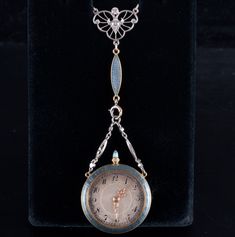 Vintage 1890's Platinum 18k Yellow Gold Diamond Enamel Watch Necklace .375ctwMetal Information: Platinum & 18k Yellow GoldTotal Weight: 31.7gPendant Dimensions: 3" x 1"Chain Width: 1.5mmChain Length: 21.5" + 3" (Watch Pendant)Circa: 1890'sAdditional Information: C.H. Meylan B RassusStone InformationMain StoneGem Type: DiamondShape: Old European (2.8mm)Color: HClarity/Quality: SI1Carat Weight: .08ctNumber of Stones: 1Accent StonesGem Type: DiamondShape: Old European (2.0mm)Color: HClarity/Quality: SI1Carat Weight: .03ctNumber of Stones: 1Accent StonesGem Type: DiamondShape: Old European (1.8mm)Color: HClarity/Quality: SI1Carat Weight: .025ctNumber of Stones: 1Accent StonesGem Type: DiamondShape: Rose (1.0mm - .80mm)Carat Weight: .01ctNumber of Stones: 24Total estimated ctw (carat total weig Antique Single Cut Diamond Necklaces For Formal Occasions, Antique Necklace With Single Cut Diamonds For Formal Events, Antique Necklace With Single Cut Diamonds For Formal Occasions, Victorian Jewelry Locket For Evening, Victorian Locket Jewelry For Evening, Antique Diamond Jewelry And Watches As Gifts, Antique Diamond Jewelry And Watches For Gift, Victorian Diamond Medallion Jewelry, Victorian Single Cut Diamonds Formal Jewelry