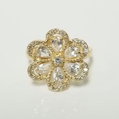 "Thanks for shopping our vintage estate store. We tend to sell well below wholesale and truly hope you enjoy all of our items. Many of the items are one of a kind, so please enjoy scrolling through the pictures and hopefully something will catch your eye. Black spots are from reflections. Estate 14k yellow gold cz 1ct diamond filigree princess ring. I just love this style. Ring size: 8 Setting: 3/4\"  Band width: 2mm Weight: 3.87 grams Marked 14k. Sweet ring. Pear and round cz diamonds in the setting. As with most estate items, there may be some wear on item. We do not sell new items, nor do we charge new retail prices." Classic 14k Stamped Flower Ring For Anniversary, Classic 14k Gold Flower Ring For Anniversary, Gold Flower Ring With Center Stone For Anniversary, Vintage Flower Ring With Prong Setting For Anniversary, Heirloom Gold Flower Ring With Center Stone, Anniversary Gold Flower Ring With Center Stone, Cubic Zirconia Diamond Ring In Flower Shape For Anniversary, Flower Shaped Cubic Zirconia Diamond Ring For Anniversary, Classic Anniversary Ring With Flower Shape