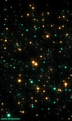 many stars in the night sky with green and white lights on them, as well as some