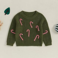 The best kind of Holiday sweater! Solid-colored stretchy and soft sweater with adorable hand embroidered candy canes all over. Hand wash inside-out cold, hang dry. Baby & Little Girls' sizes 3M-3T. Sweater has oversized fit. Available in two colors. Good things take time. Quicker shipping: This top ships directly to you from our overseas warehouse, and will arrive in approximately 7-12 business days. Limited Stock. Tops Winter, Things Take Time, Knitted Long Sleeve, Good Things Take Time, Girl Christmas, Long Sleeve Pullover Sweater, Winter Baby