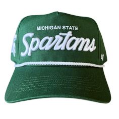 A head-on view of a green baseball cap with Michigan State embroidered in white above an embroidered stylized script reading “Spartans” in white with a silver outline. Embroidered on the right temple panel is a white Spartan helmet, and the left temple panel features an embroidered ’47 logo in white. Over the bill is a white braided cord. Green Curved Visor Trucker Hat For Baseball Season, Green Trucker Hat With Curved Visor For Baseball Season, Collegiate Adjustable Baseball Cap With Curved Brim, Green Adjustable Baseball Cap With Curved Brim, Green Curved Bill Hat For Baseball Season, Green Trucker Hat With Curved Bill For Baseball Season, Green Adjustable Curved Brim Baseball Cap, Collegiate Snapback Hat With Curved Bill, Collegiate Adjustable Snapback Trucker Hat