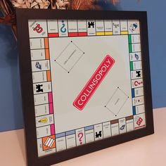 a monopoly board game sitting on top of a table