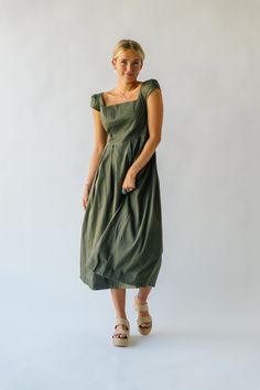 This playful, quirky dress exudes confidence with its ruffle sleeves and flattering midi length. Perfect for adding some fun to your everyday wardrobe, its olive color adds a touch of personality to any outfit. Get ready to turn heads and feel fabulous in the Whitmire Ruffle Sleeve Midi Dress! self/lining: 100% cotton Fabric Care Guide Here Sizing & Fit Measurements are approximate and taken while laying flat across the front. Not doubled. x-small: bust = 14.5"; waist = 13"; length = 48" small: