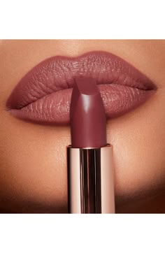 What it is: A magical, matte lipstick with a long-lasting, buildable, hydrating formula featuring 3D glow pigments to create lips that appear wider and fuller.What it does: This lipstick is exclusively enriched with Lipstick Tree extract, Charlotte's secret ingredient, and orchid extract to protect and soothe for a cashmere finish. How to use: Begin by applying lip liner, filling in the lips for added intensity. Then, apply Matte Revolution straight from the bullet for fuller, wider, lit-from-wi Pillow Talk Medium, Nude Pink Lipstick, Permanente Make-up, Revolution Lipstick, Pillow Talk Lipstick, Charlotte Tilbury Matte Revolution, Perfect Lipstick, Hydrating Lipstick, Lipstick Shade